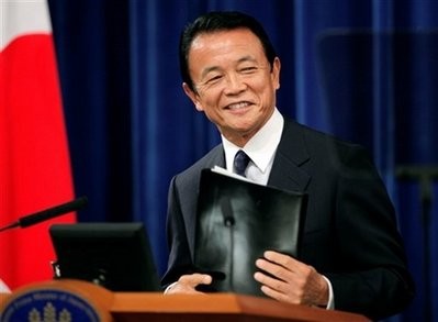 Japanese Prime Minister Taro Aso leaves his final news conference as prime minister at the official residence in Tokyo Wednesday, Sept. 16, 2009 Japanese Prime Minister Taro Aso leaves his final news conference as prime minister at the official residence in Tokyo Wednesday, Sept. 16, 2009